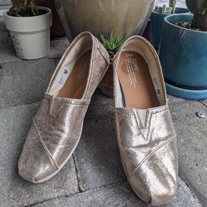 Rose gold TOMS loafers